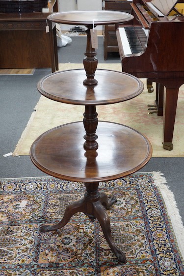 A George III style circular mahogany three tier dumb waiter
